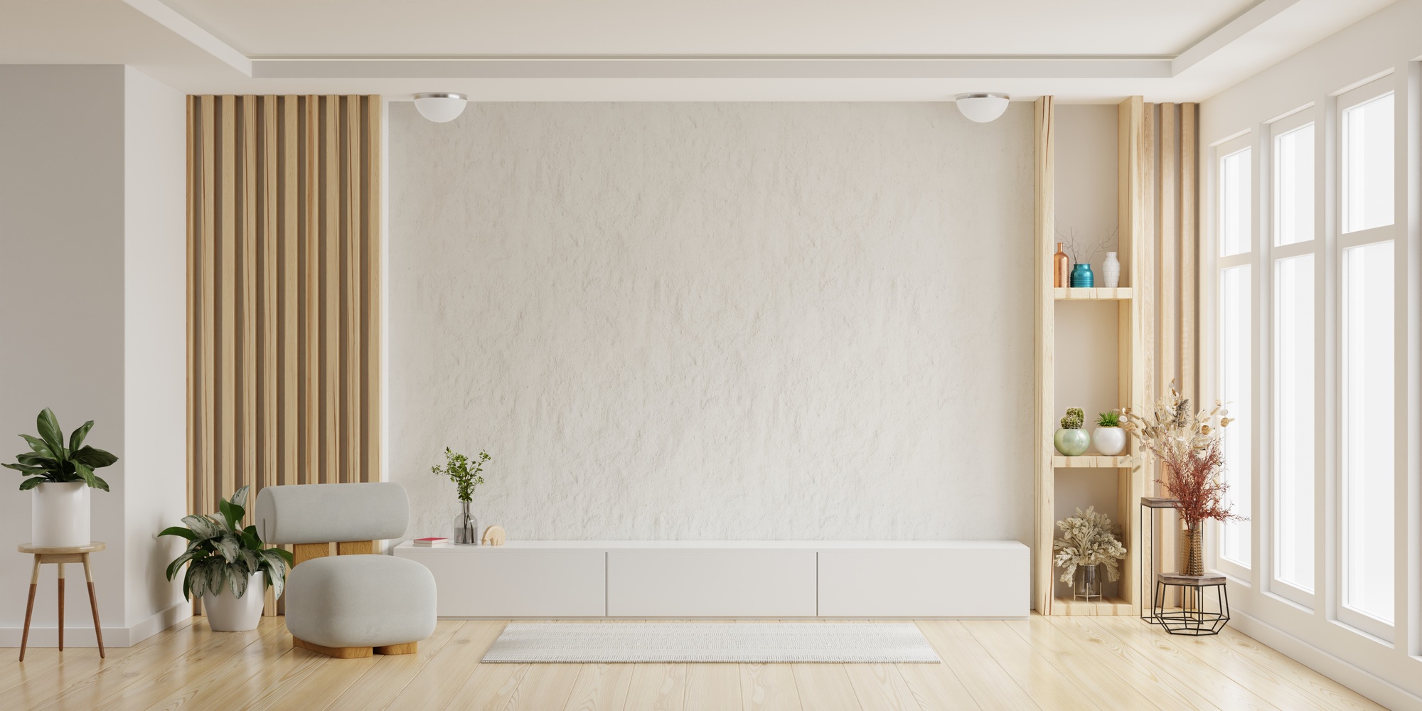 Mockup a cabinet TV wall mounted with armchair in living room with a white cement wall